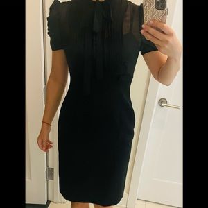 Calvin Klein black dress. Top lace with a bow.